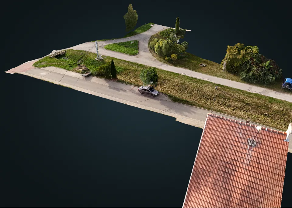 Detail texturovaného 3D modelu, střecha a ulice